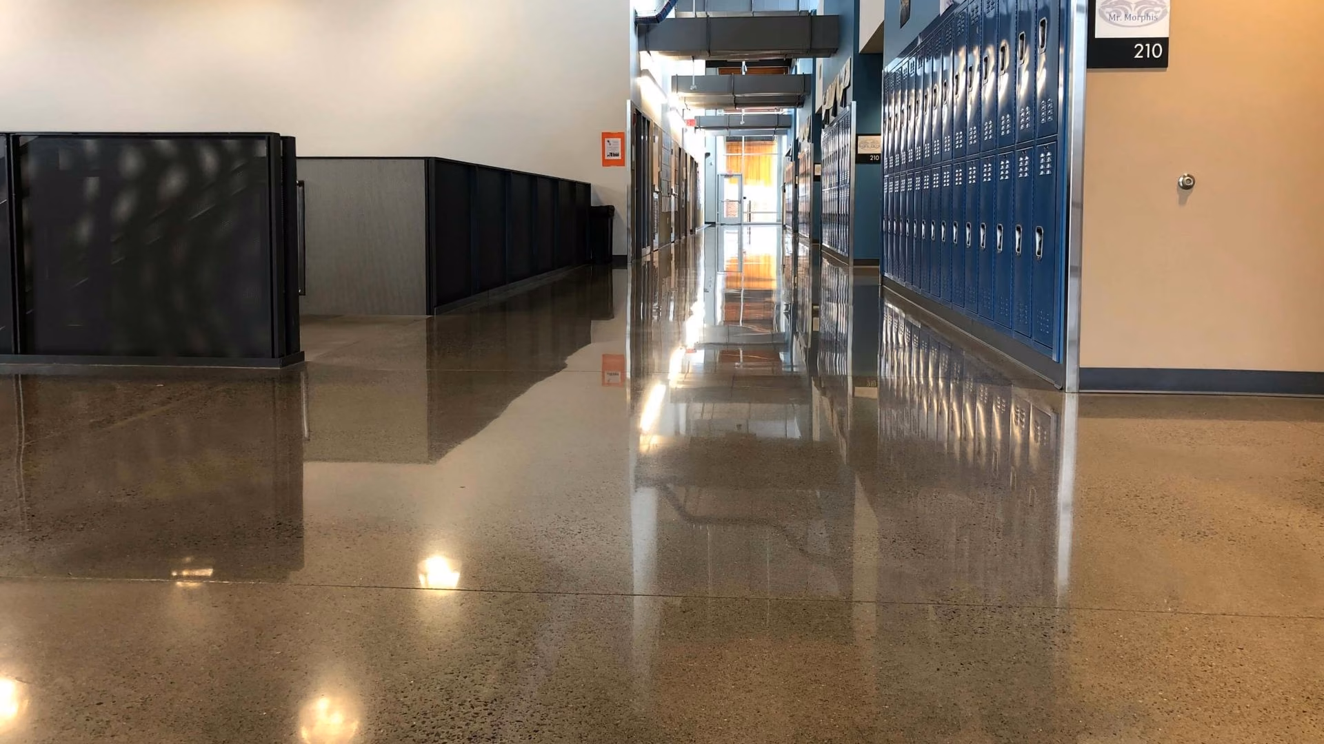 Side-by-side comparison of polished concrete and tile flooring options