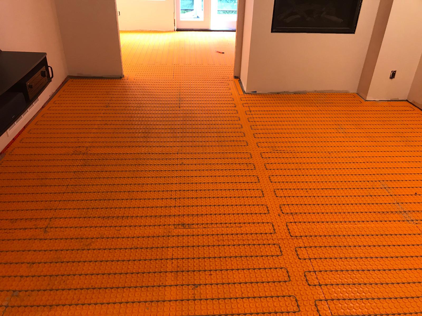 In-floor radiant heating system installation in Vancouver